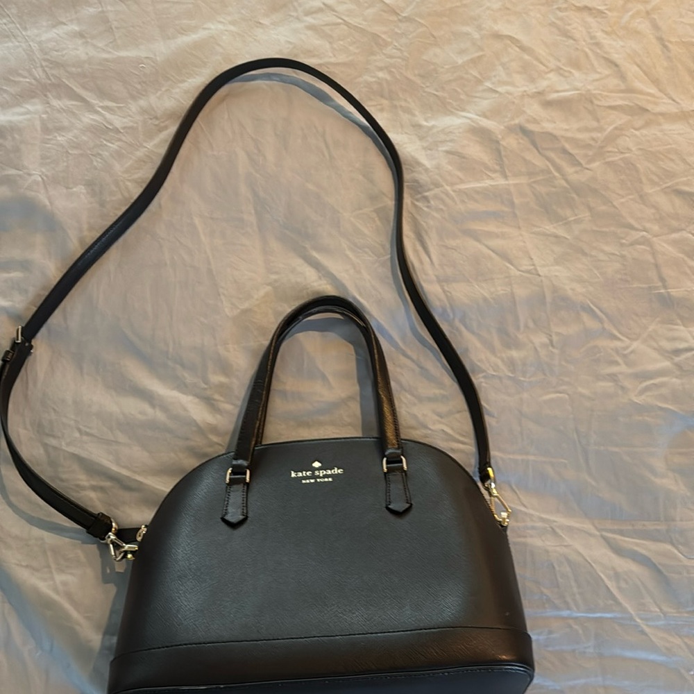 Kate Spade pure leather lightly used cross body duffle black bag